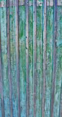 Cracked weathered blue and green shabby chic painted wooden board texture, front view
