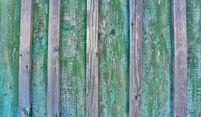 Cracked weathered blue and green shabby chic painted wooden board texture, front view