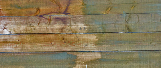 weathered fir planks on old fence, texture with vignette