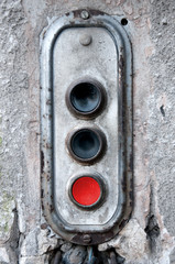 control panel with red button