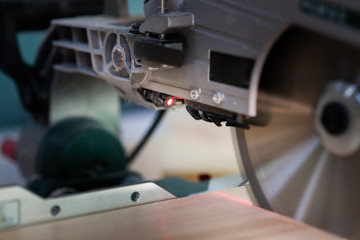  Modern electric circular saw in the workshop