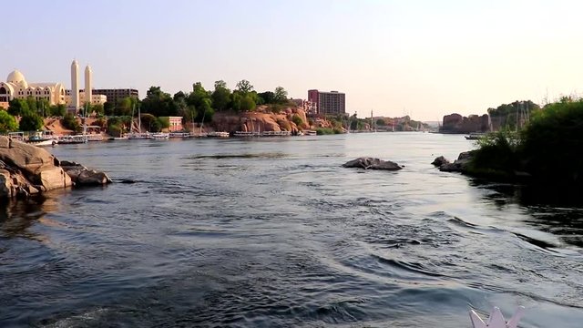 Sailing on the Nile river at sunset in Aswan, Egypt