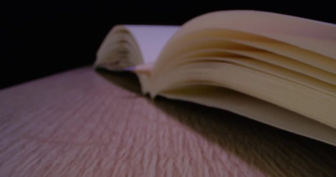 Copy book with Pencil. Sketch book. Macro Wide Angle. 4K.