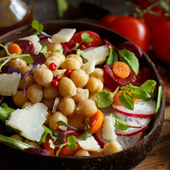 Chickpea salad with vegetables and microgreens