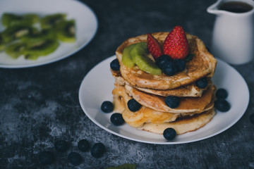 Pancakes on white plate