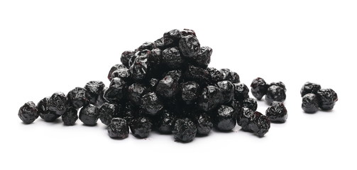 Dried aronia berries isolated on white background