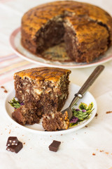 Sliced tasty chocolate cake on table. Tasty chocolate  homemade cake. Tasty sweet dessert. Fresh Homemade bakery products.
