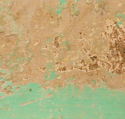 Old plaster on the wall of the house as an abstract background