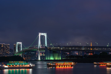 Fototapeta na wymiar Beautiful night view of Odaiba, Tokyo Tower and Rainbow Bridge in Tokyo, Japan