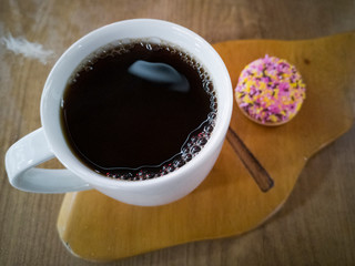 White coffee mug and cake