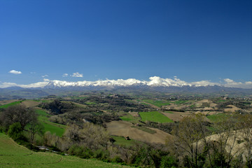Fototapeta na wymiar panorama of mountains,Italy,countryside,hill,landscape,sky,blue,cloud,view,spring,travel,tourism