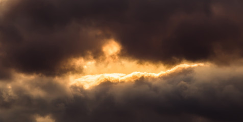 Fototapeta na wymiar Clearance in the clouds at sunset