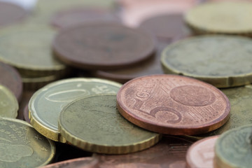 Euro cents coins with a small value. Savings of coins.