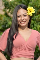 Happy Young Filipina Person With Flowers