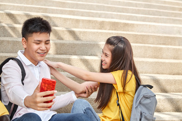 Selfie-portrait of funny couple outdoor