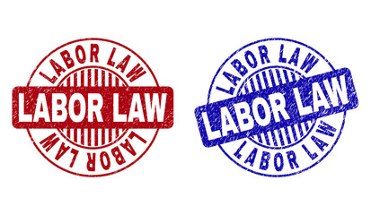 Grunge LABOR LAW round stamp seals isolated on a white background. Round seals with grunge texture in red and blue colors. Vector rubber overlay of LABOR LAW label inside circle form with stripes.