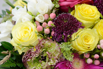 bouquet with roses and many colorful flowers