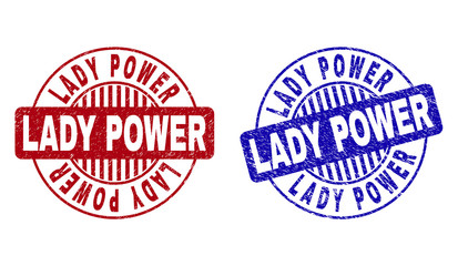 Grunge LADY POWER round stamp seals isolated on a white background. Round seals with grunge texture in red and blue colors. Vector rubber imitation of LADY POWER title inside circle form with stripes.