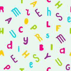 Colored letters on white background. Seamless pattern. Vector.