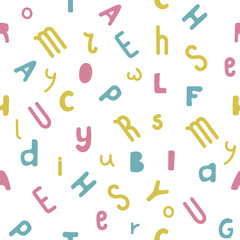 Colored letters on white background. Seamless pattern. Vector.