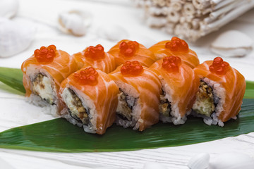 Japanese cuisine. Sushi rolled in a fresh salmon