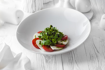 Fresh tasty salad made of tomatoes and cheese