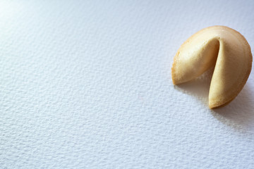 Fortune cookie on white background.