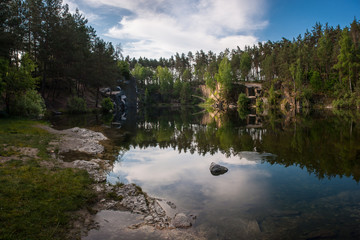 Landscape with lake in old granite quarry
