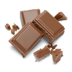 Milk organic chocolate pieces isolated on white background