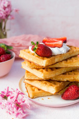 Homemade belgian Waffle. Strawberies and whiped cream.