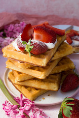 Homemade belgian Waffle. Strawberies and whiped cream.