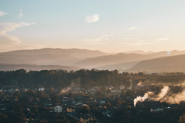 Beautiful golden hour on a autumn day with a village © Voicu