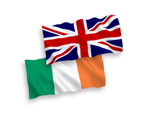 National vector fabric wave flags of Great Britain and Ireland isolated on white background. 1 to 2 proportion.