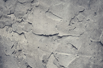 Old concrete wall. Gray plaster. Close-up. Background. Texture.