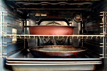 Open oven. Inside view. Close-up. Background.