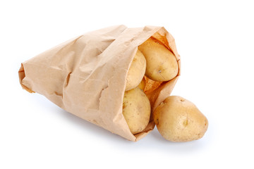 Bag with raw potato on white background