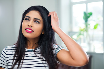 Fototapeta premium Young indian woman face close-up