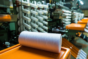 old knitted fabric. Textile factory in spinning production line and a rotating machinery and equipment production company