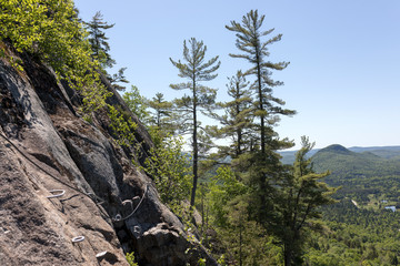 Via Ferrata Du Diable of La Diable sector at Mont Tremblant National Park is a path that goes its way along the Vache Noire rock at an altitude of 200 m