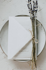 Invitation on handmade plate with lavander, simplicity is beautiful, minimalism desgn