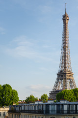 Fototapeta na wymiar The Eiffel Tower over the roofs of Paris - Paris, France