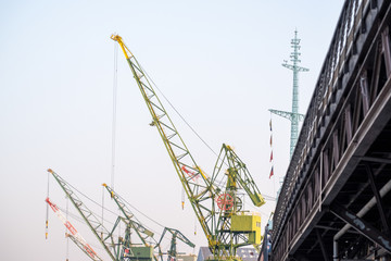 Twilight Kobe Harbor shipyard crane in summer time Kobe Japan