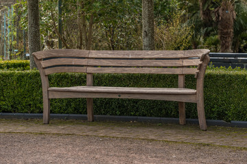 Fototapeta na wymiar Wooden Garden bench chair