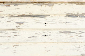 old white wooden wall of boards