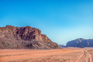 .incredible lunar landscape in Wadi Rum in the Jordanian red sand desert. Wadi Rum also known as The Valley of the Moon,  Jordan - Image