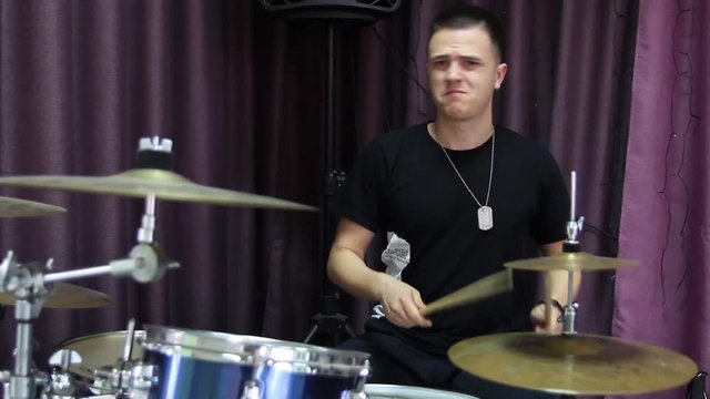 Professional drummer playing drums