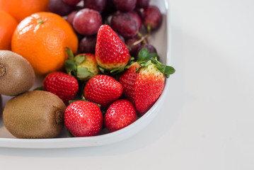 Fresh mixed fruits on plate