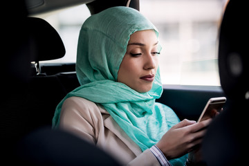 Business Woman In A Taxi