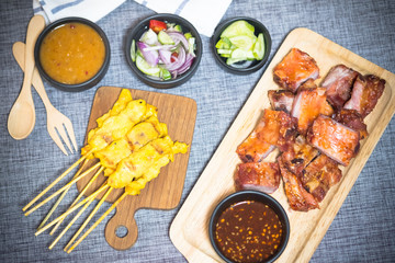 Pork satay served with roasted ribs