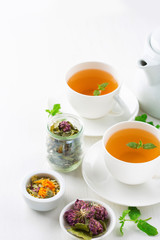 cup of herbal tea, white background
